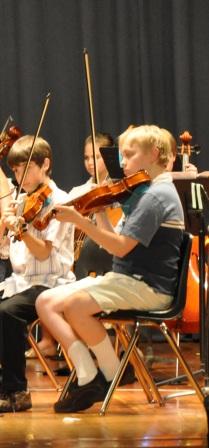 Jeffery plays viola at fifth grade concert