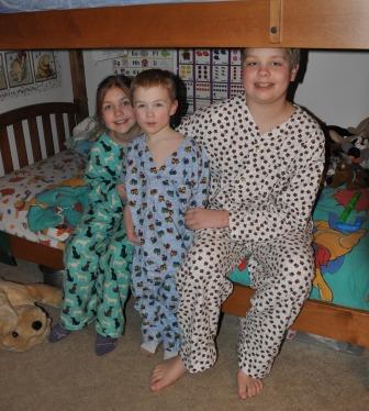 Enjoying the PJs that Grandma made