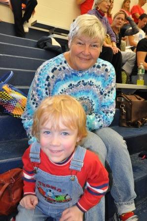 Grandma keeps an eye on Thomas so Laura can snap some photos