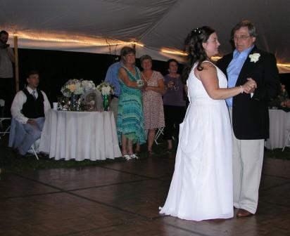 Janine and Uncle George dance while groom and Aunt Linda look on