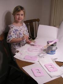 Bethan helps paint