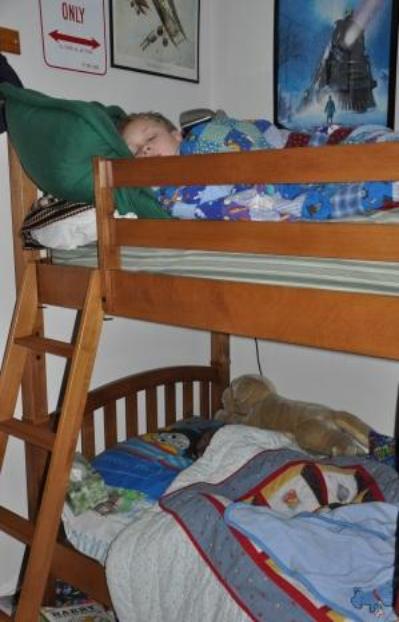 Somebody is sleeping in the big boy bunk bed with big brother!