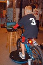 Luke making sure the virtual biking works