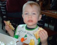 Thomas enjoys lunch in the Charlotte Airport