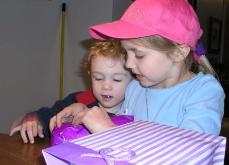 Thomas helps with gifts