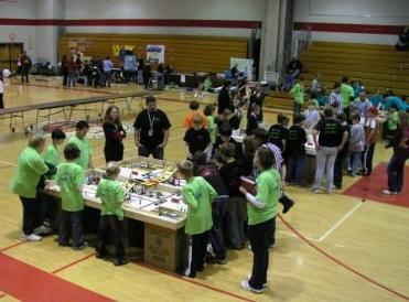 practice runs with Canandaigua Middle School on other half of table