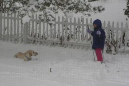 Jake and Bethan enjoy a ski in the back yard.