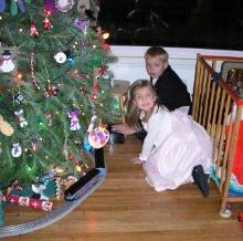Jeffery runs his Polar Express around the tree