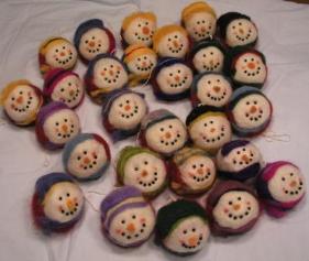 Needle felted ornaments ready to be tagged
