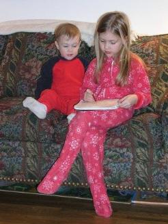 Bethan reads her story to Thomas