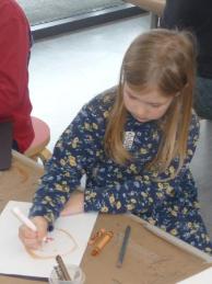 Bethan working on her portrait