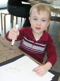 Thomas works on his picture