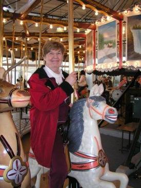 Enjoying the carousel at the NYS Museum