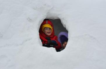 Peeking out of the sculpture window
