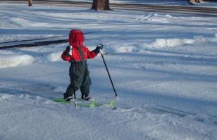 Thomas ENJOYING the skis at home