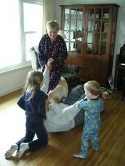 Helping Daddy up...and our new bookshelf!