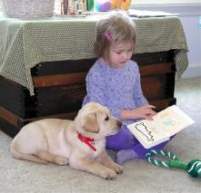 Little Jake enjoys being read to.