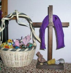 basket of handpainted eggs and Easter Cross