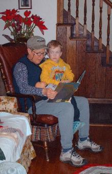 Aunt Jan reads SOMEPLACE ELSE (with a Studebaker truck in it).