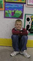 with his art show piece in third grade