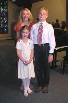 After the recital with piano teacher, Larisa.