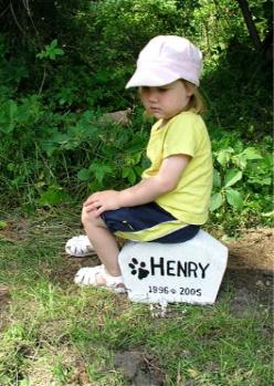 Henry is buried in Grandma and Grandpa's backyard.