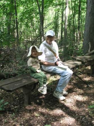 Thomas and Maya enjoying a trail side bench.