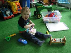 Thomas playing on the back porch