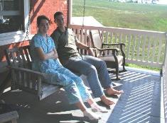The Barlows on the porch swing
