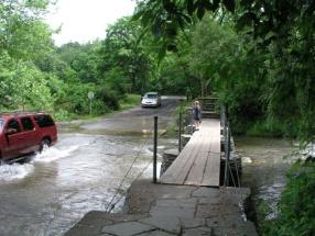 Driving through the water at lower Robert H Treman SP