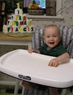Thomas with his birthday cake that Mommy made
