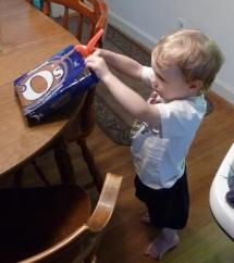 Our tool guy using pliers to open cookies