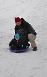 Thomas tests out his new sled