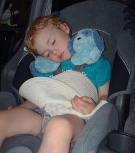 A VERY rare site...Thomas asleep in the van