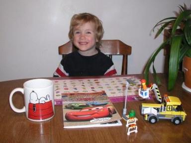 Thomas with his purchases from the birthday gift card Cioci Chris gave to him