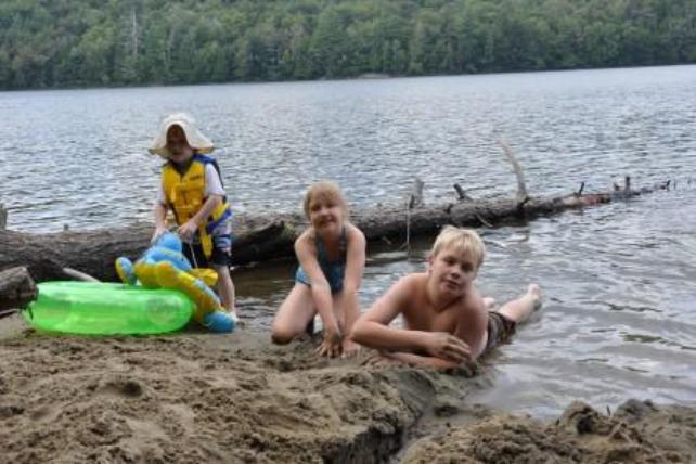 Enjoying our Eighth Lake beach